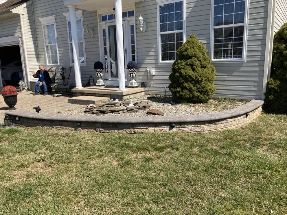 Custom yard cleanup service for residential properties in Newark, DE by Green Earth