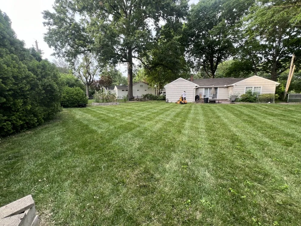 Affordable residential landscaping for year-round maintenance in Overland Park, KS by Green Edge Lawn Care