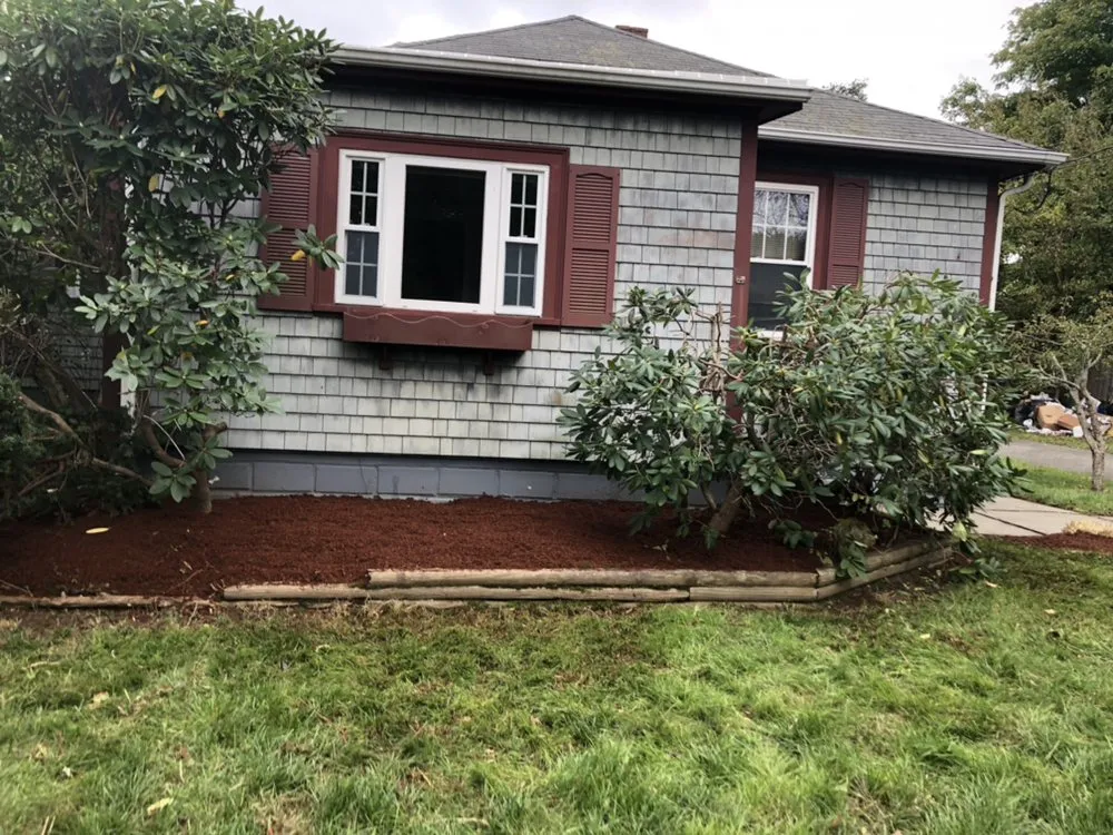 Professional yard cleanup service in Lincoln, RI by Green Environment Landscaping