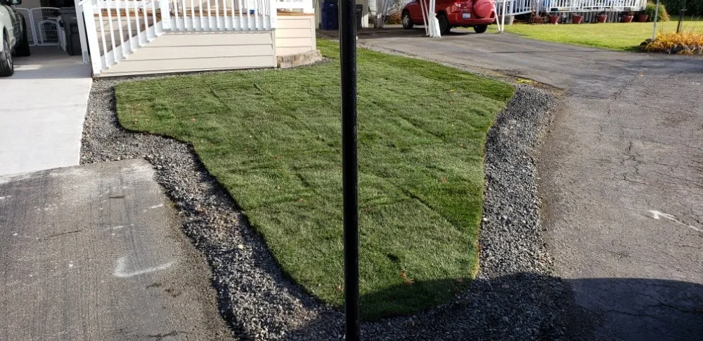 Local landscape design with custom design in Hutchinson, KS by Green Escapes Lawn Care