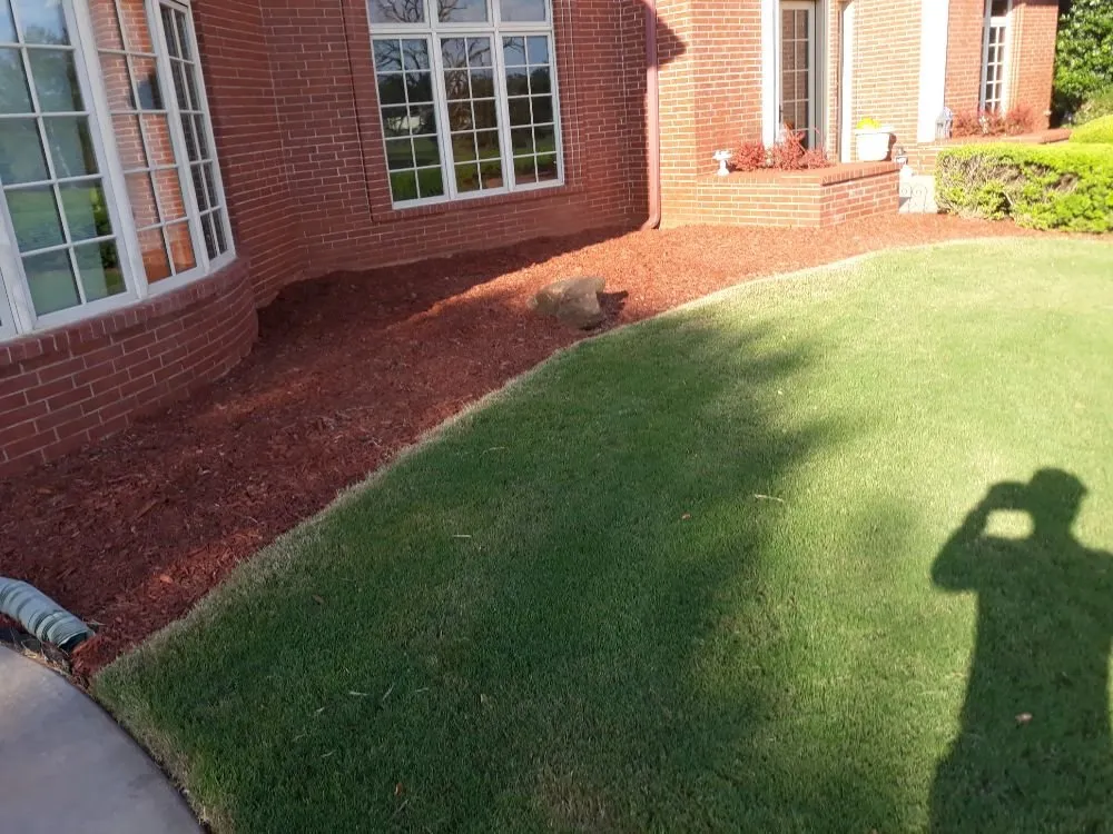 Custom landscaping services for beautiful yards in Norman, OK by Green Essence