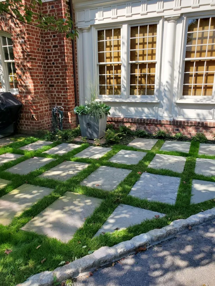 Affordable lawn mowing service for residential properties in Richmond, VA by Green Estates Landscape & Garden