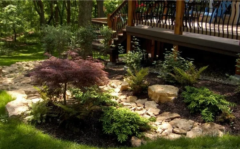 Local residential landscaping for year-round maintenance in Overland Park, KS by Green Expectations Landscaping
