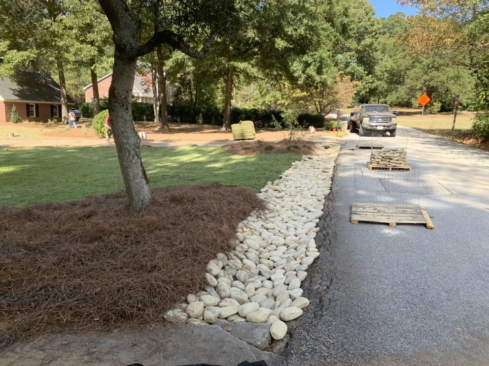 Trusted lawn mowing service with custom design in Covington, GA by Green Fields Land Management Services