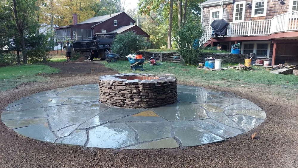 Professional lawn mowing service for year-round maintenance across Sharon, MA - Green Fields Landscaping