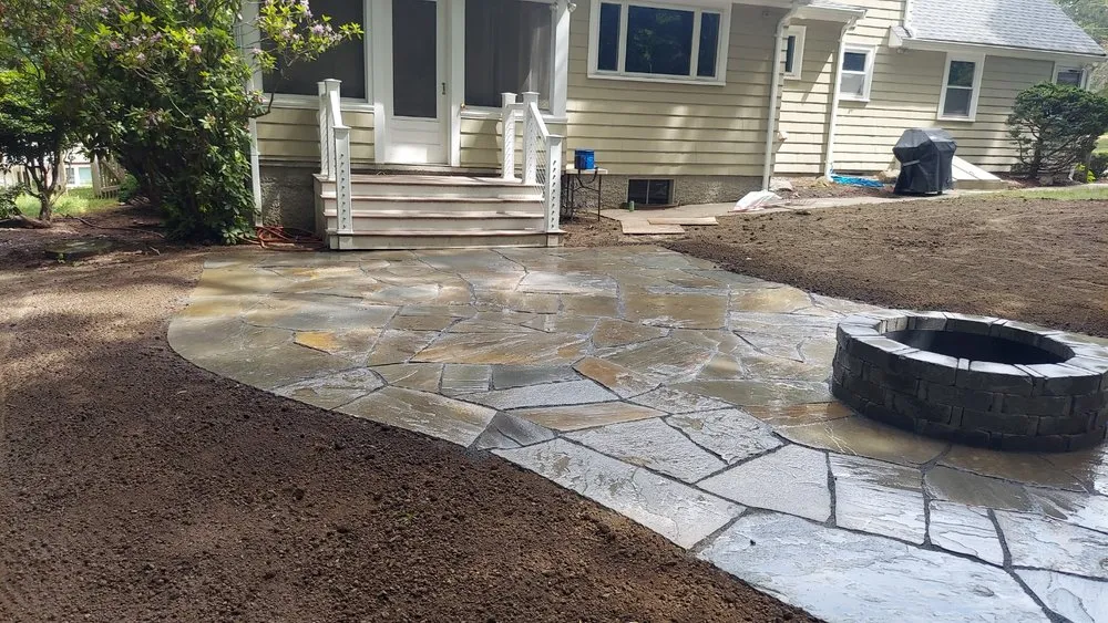 Local landscape installation for homes in Sharon, MA by Green Fields Landscaping