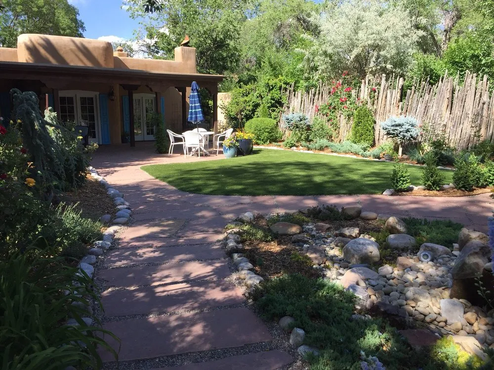 Expert lawn mowing service with custom design across Santa Fe, NM - Green Garden And Handyman