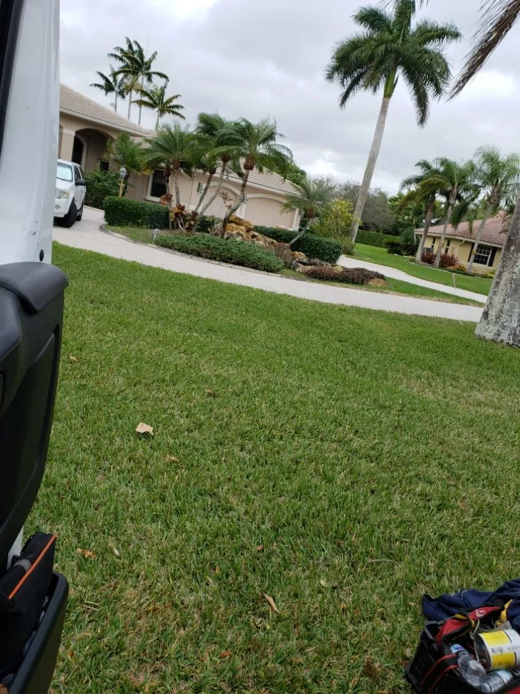 Local landscape installation for year-round maintenance in Port St Lucie, FL by Green Gold Lawn Care