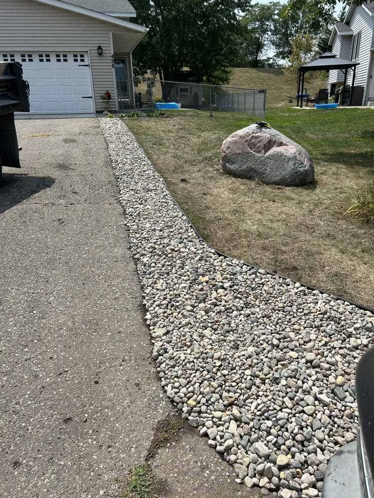 Custom garden landscaping with custom design in Savage, MN by Green Gorilla Lawn Care