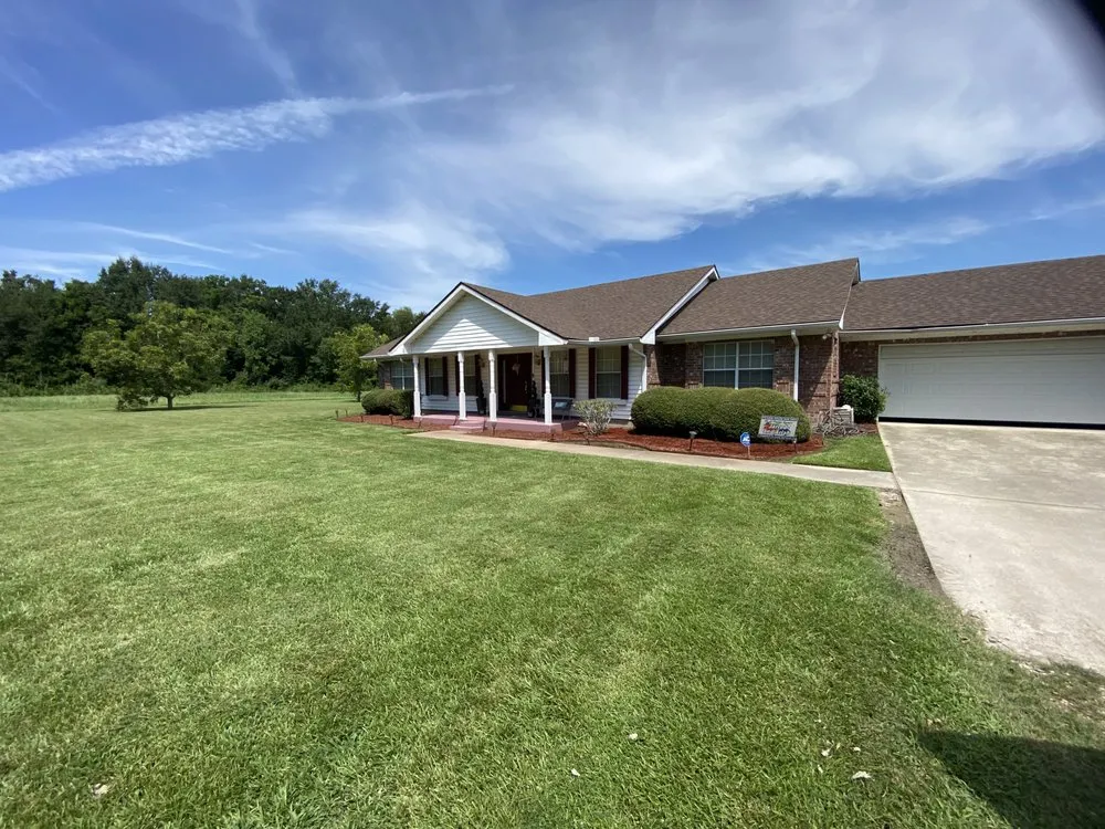 Custom landscape design with custom design in Lafayette, LA by Green Grace Lawn Care and Landscaping