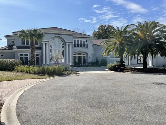 Green Heron Lawn Care Logo