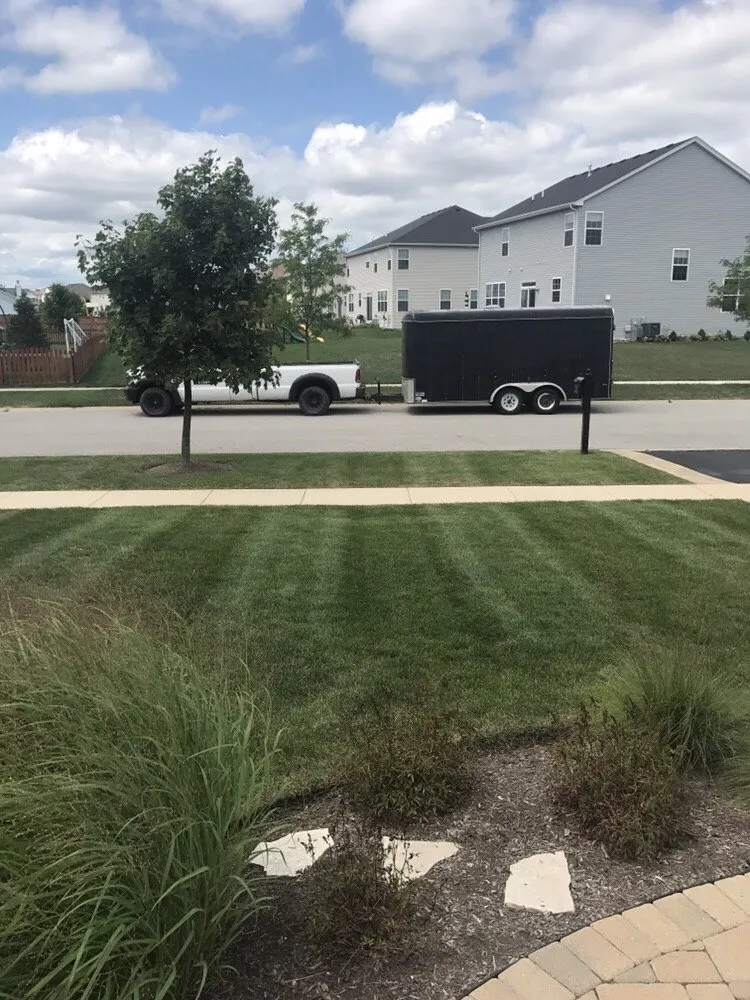 Custom outdoor landscaping for year-round maintenance in Sandwich, IL by Green Hill Landscaping