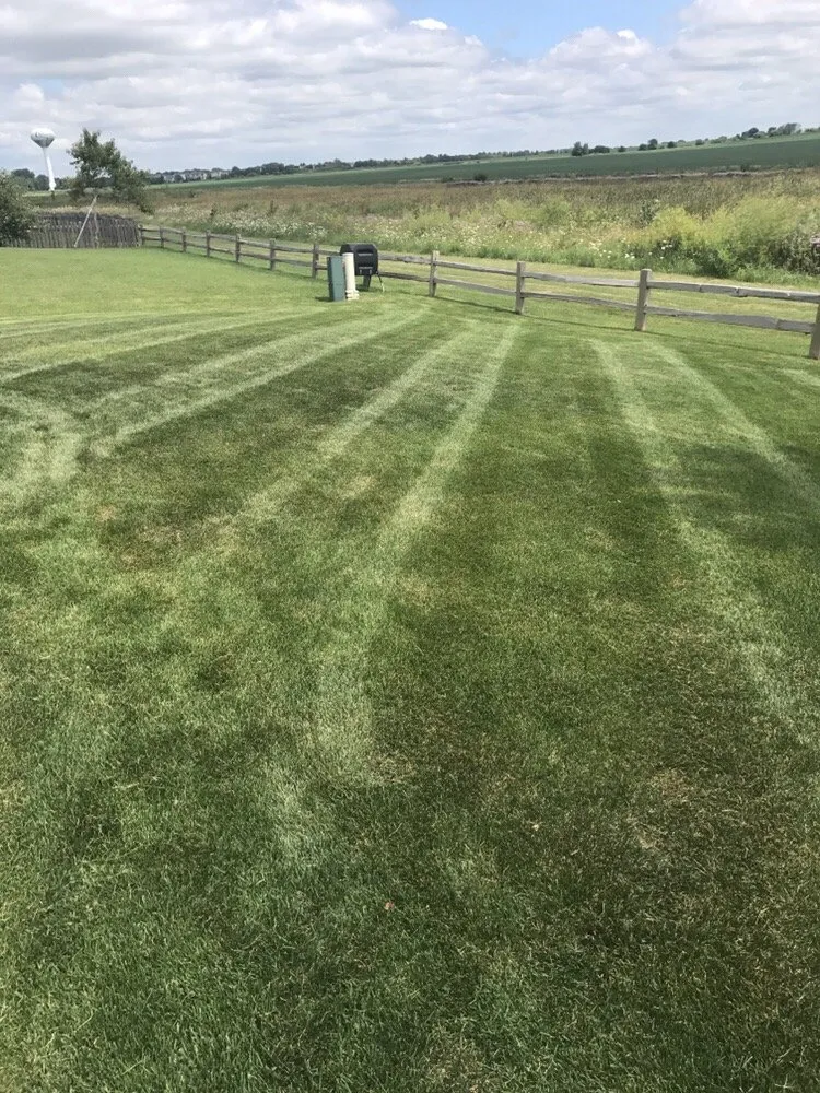 Reliable lawn mowing service in Sandwich, IL by Green Hill Landscaping