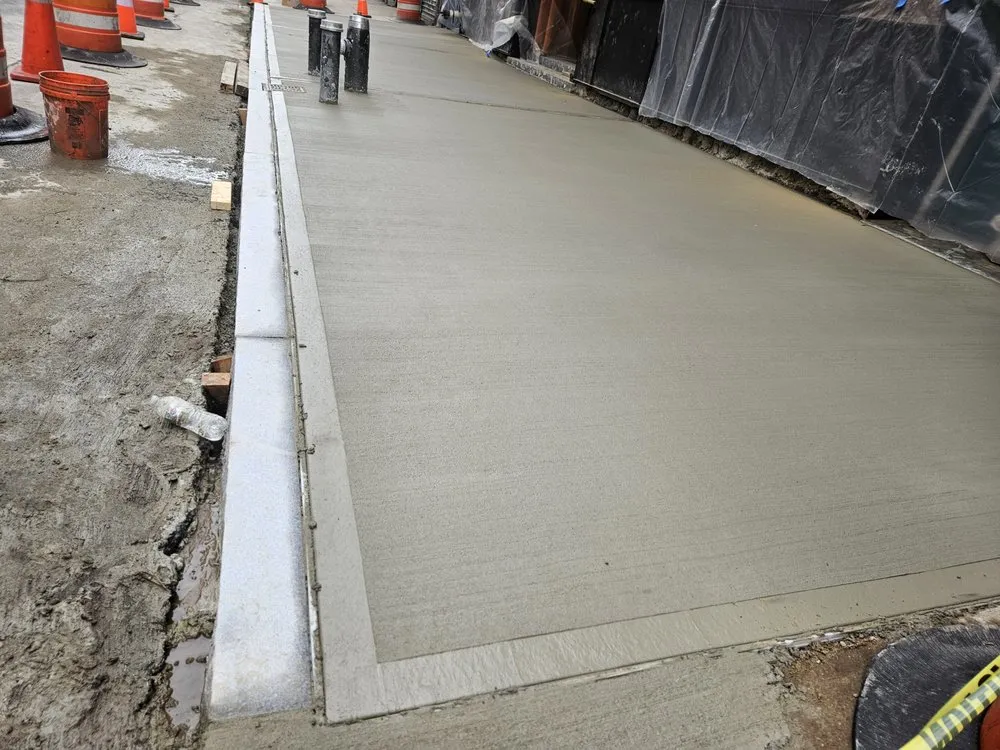 Professional lawn mowing service for year-round maintenance in Medford, NY by Green Hills