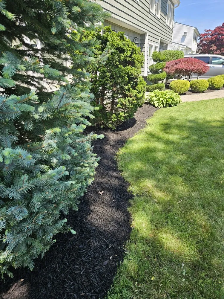 Affordable landscape design for beautiful yards in Medford, NY by Green Hills