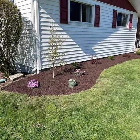 Local lawn care service for outdoor upgrades in Islip, NY by Green Horizon Landscaping & Design