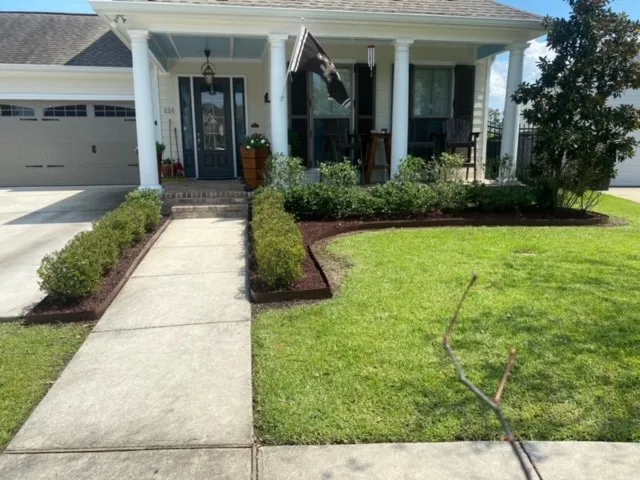 Custom yard cleanup service for residential properties in Gretna, LA by Green Land Nola
