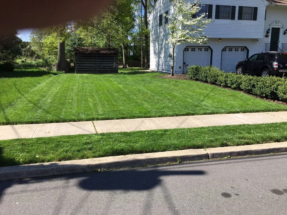 Expert lawn mowing service with custom design in West Chester, PA by Green Lawn Fertilizing