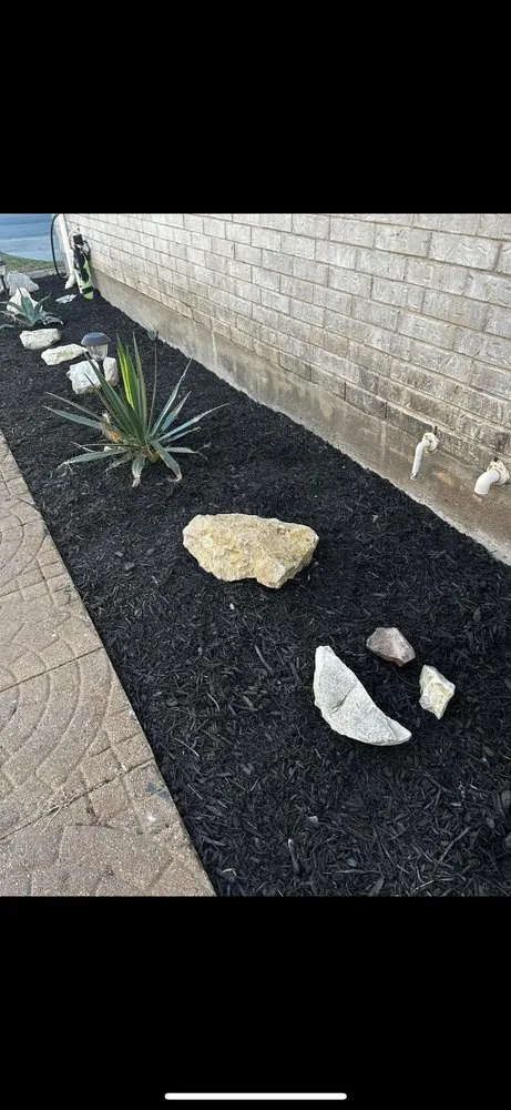 Custom residential landscaping for residential properties across Mustang Ridge, TX - Green Lawn Landscape & Maintenance