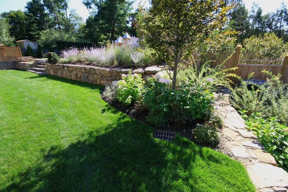 Custom yard maintenance for outdoor upgrades in Spring Valley, NY by Green Lawns