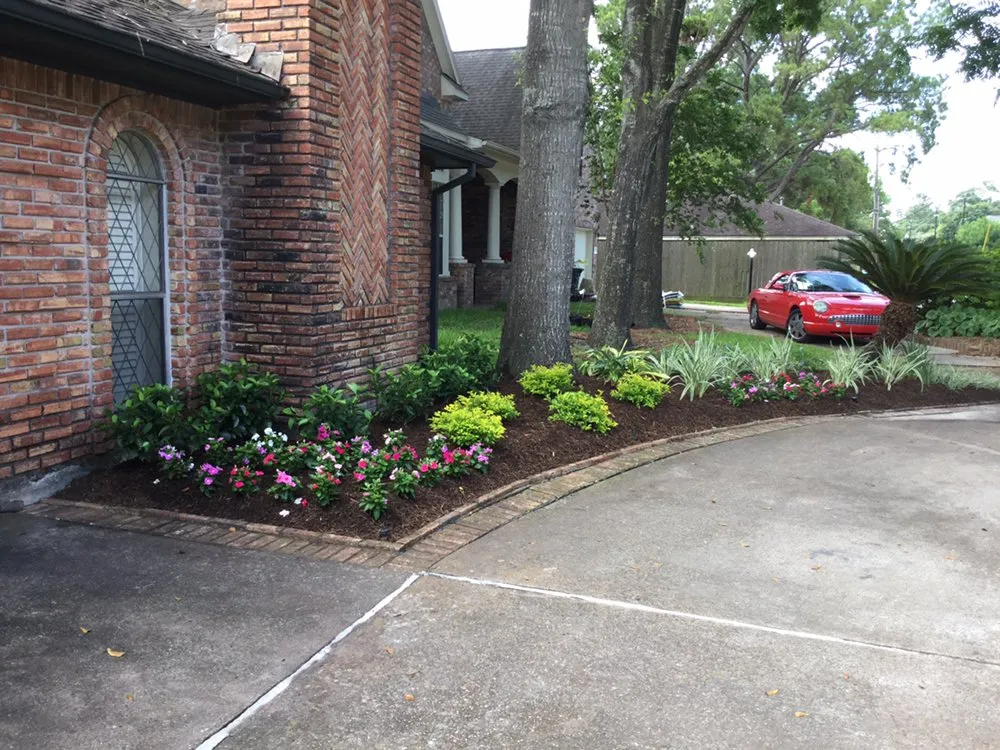 Expert landscape installation with custom design in Katy, TX by Green Leaf Tree Services