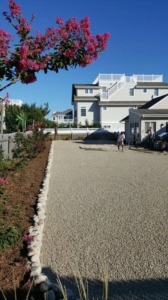 Custom yard cleanup service for residential properties in West Creek, NJ by Green Life Landscaping and Pavers