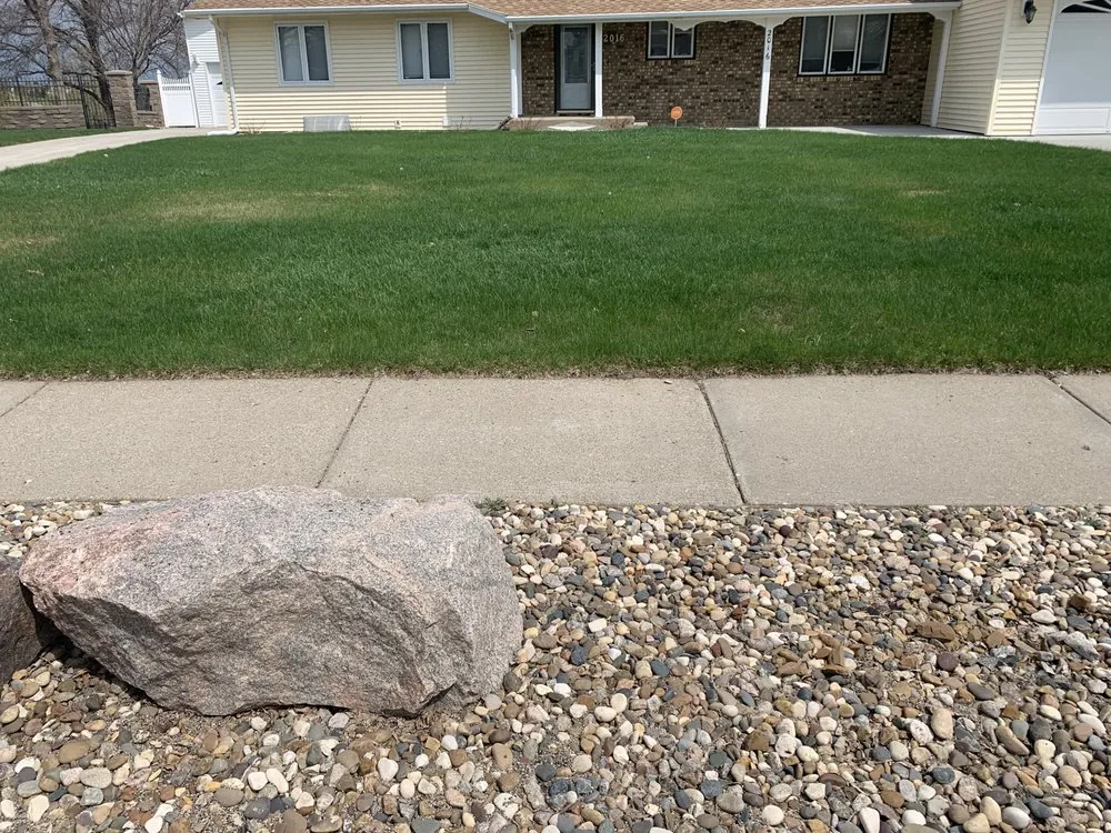 Local garden landscaping with custom design in Bismarck, ND by Green Line Lawn Care