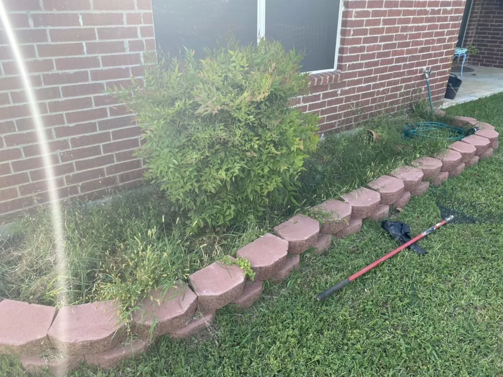 Custom garden landscaping in Whitesboro, TX by Green Line Lawncare & Landscape