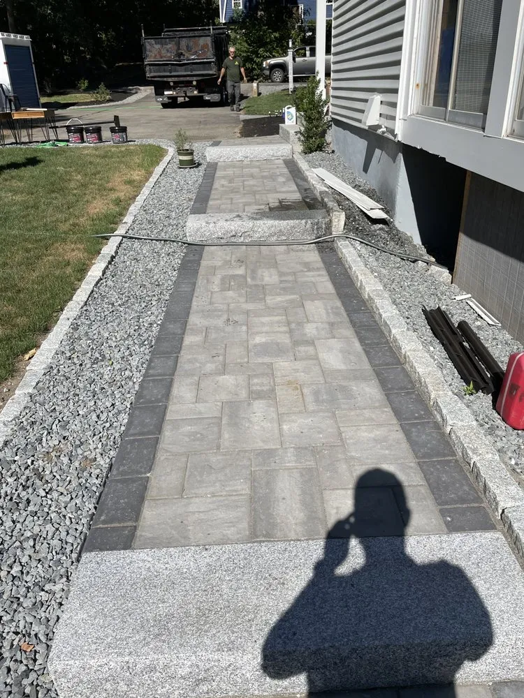 Professional lawn mowing service for homes in Framingham, MA by Green Local Landscaping