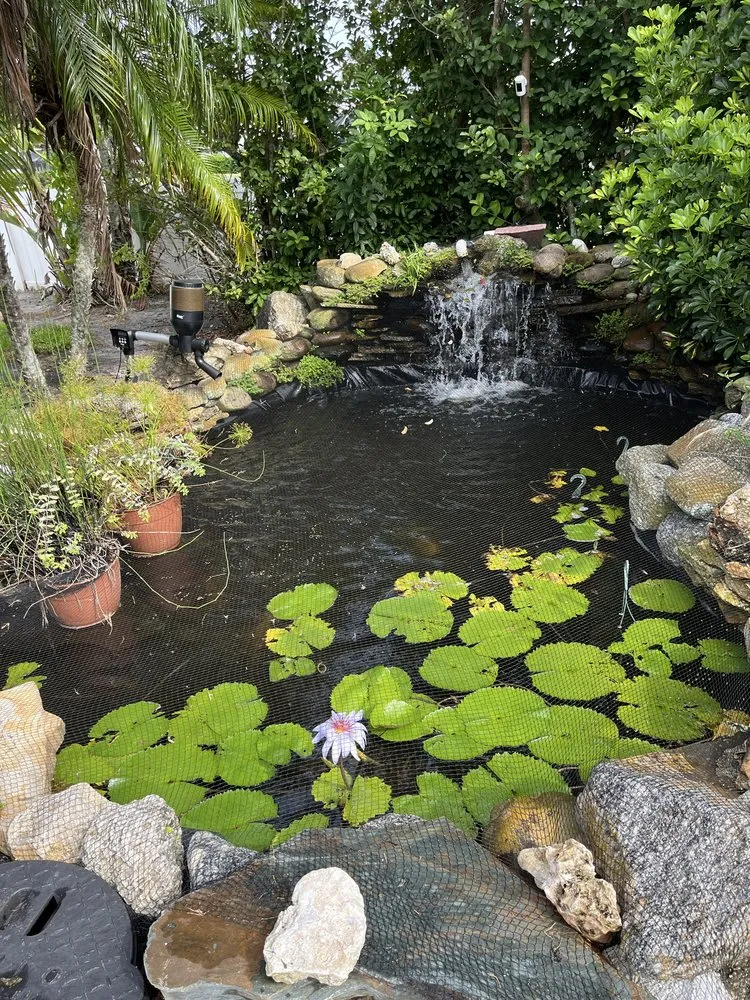 Local outdoor landscaping with custom design in Sarasota, FL by Green Machine Landscaping And Pond Services