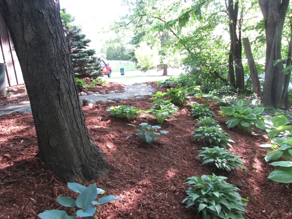 Reliable lawn mowing service for homes in New Berlin, WI by Green Machine Landscaping