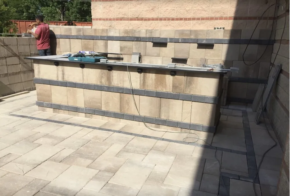 Custom landscape design for year-round maintenance in Des Plaines, IL by Green Master Turf Inc