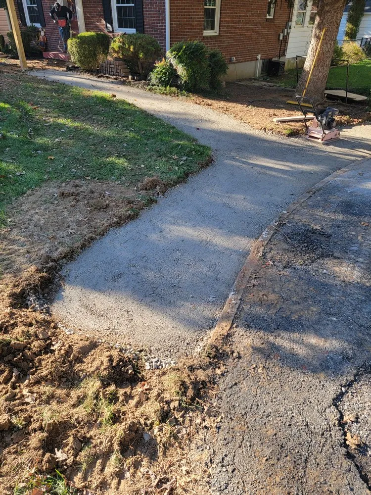 Professional yard maintenance with custom design in Louisville, KY by Green Meadows Landscaping