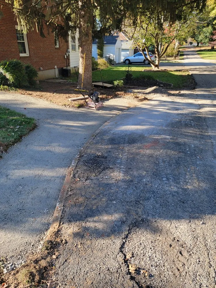 Reliable lawn mowing service for homes in Louisville, KY by Green Meadows Landscaping