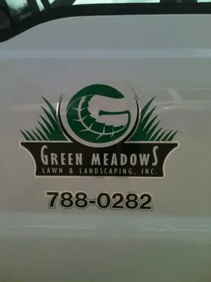 Green Meadows Lawn and Landscaping Logo