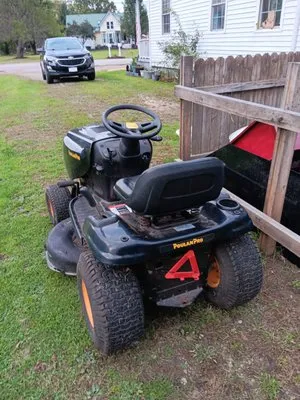 Green Mile Lawncare Logo