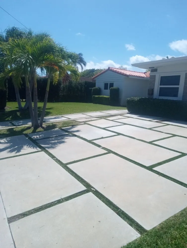 Custom yard cleanup service for year-round maintenance in Miami, FL by Green Motion Groundskeepers