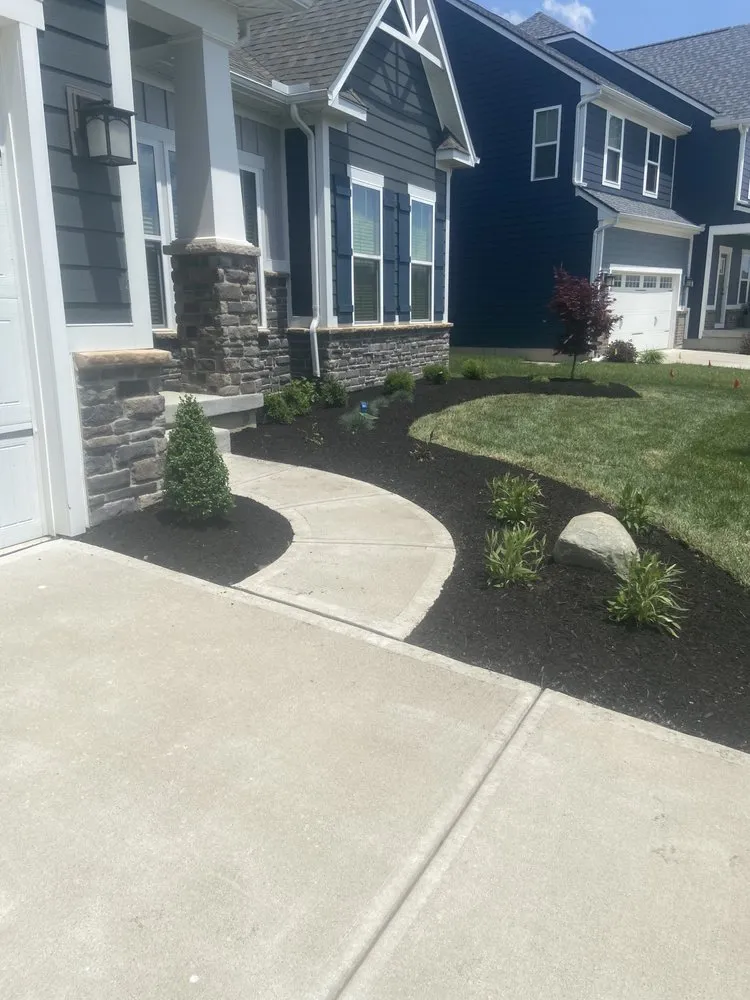 Expert landscaping services with custom design in New Carlisle, OH by Green Oaks Lawn & Lansdscaping