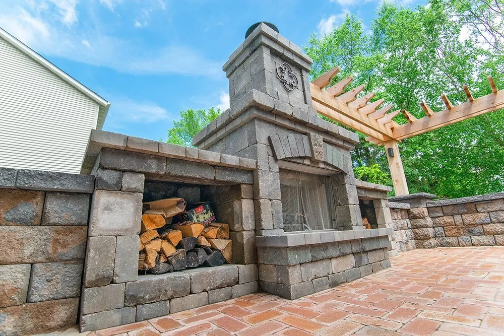 Custom lawn mowing service with custom design in River Falls, WI by Green Oasis