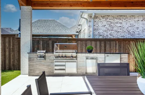 Professional lawn mowing service for outdoor upgrades in Frisco, TX by Green Paradise Construction And Design