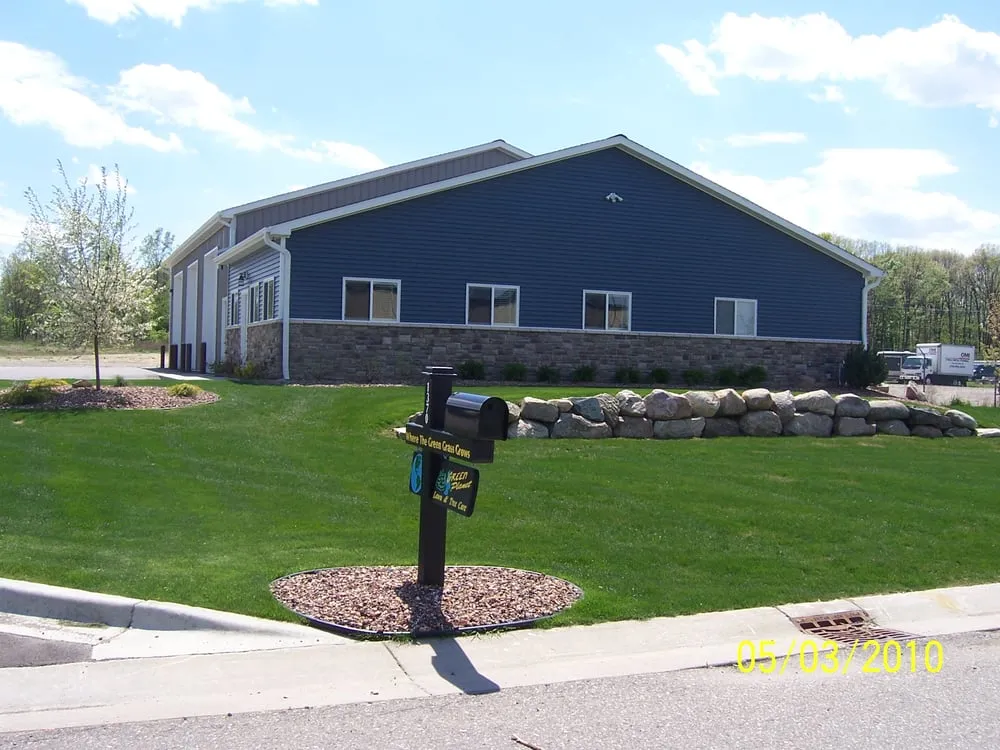 Custom landscape design for beautiful yards across Burton, MI - Green Planet Lawn And Tree Care