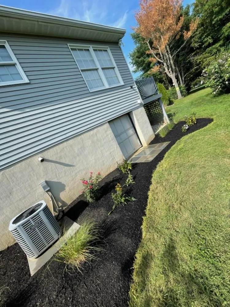 Expert lawn care service for beautiful yards in Newark, DE by Green Planet 's Erni Landscaping / Hardscaping