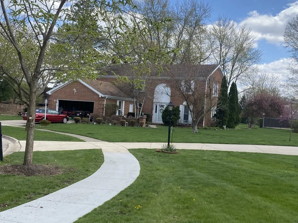 Affordable yard cleanup service for beautiful yards across Woodstock, IL - Green prairie landscaping