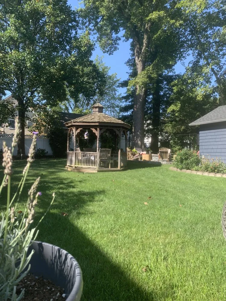 Affordable lawn mowing service for homes in Clark, NJ by Green Roots Organic