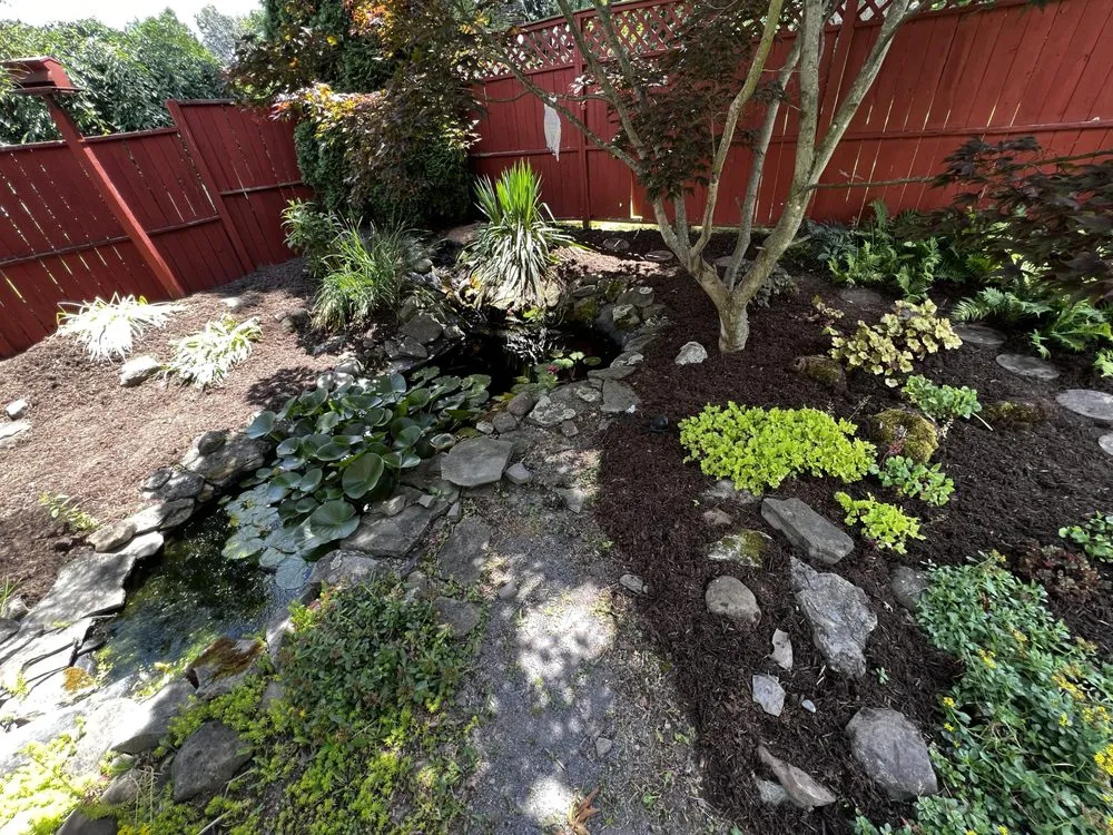 Custom lawn mowing service for homes in Macedon, NY by Green Scaping