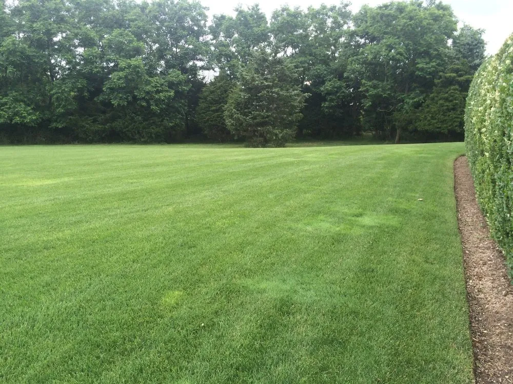 Trusted lawn mowing service for residential properties in Hampton Bays, NY by Green Season Landscaping