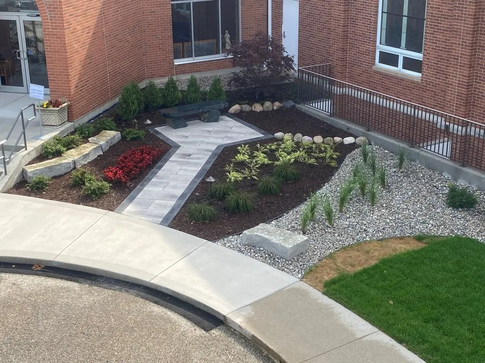 Affordable lawn mowing service for residential properties in Alma, MI by Green Side Up