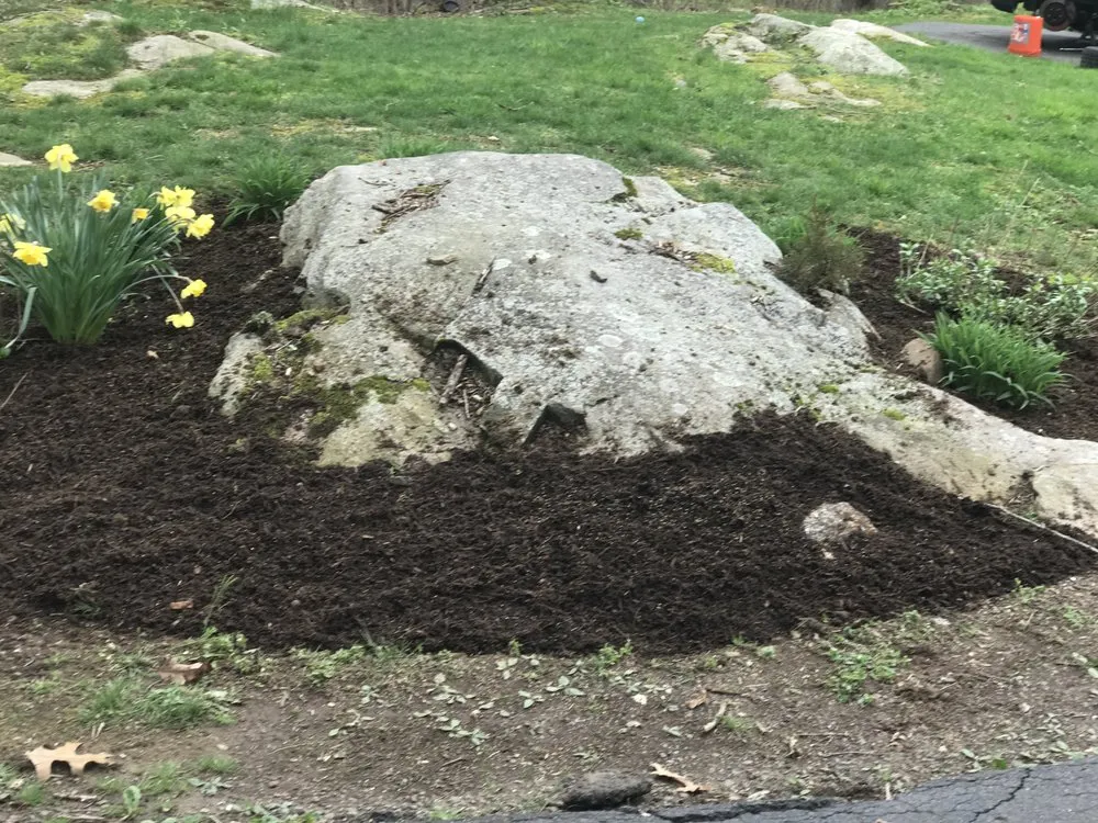 Custom residential landscaping with custom design in Westbrook, CT by Green Team Lawn Care