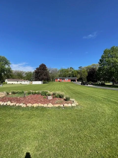 Expert yard cleanup service for outdoor upgrades in Neenah, WI by Green Thumb Academy