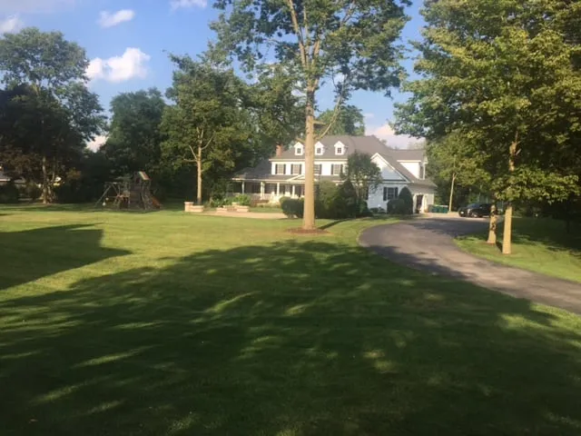 Affordable lawn mowing service for outdoor upgrades across Batavia, IL - Green Thumb Brown Boots